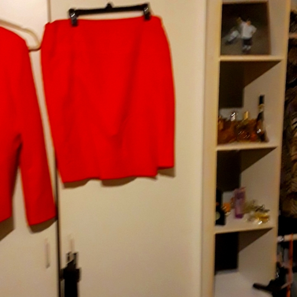 A red dress suit( Blazer and skirt worn once)